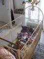 After a long afternoon of site-seeing, Erika takes a rest in her Parisian-style bed. Martine has the house set up for grandchildren, with lots of toys and accomodations for small ones.