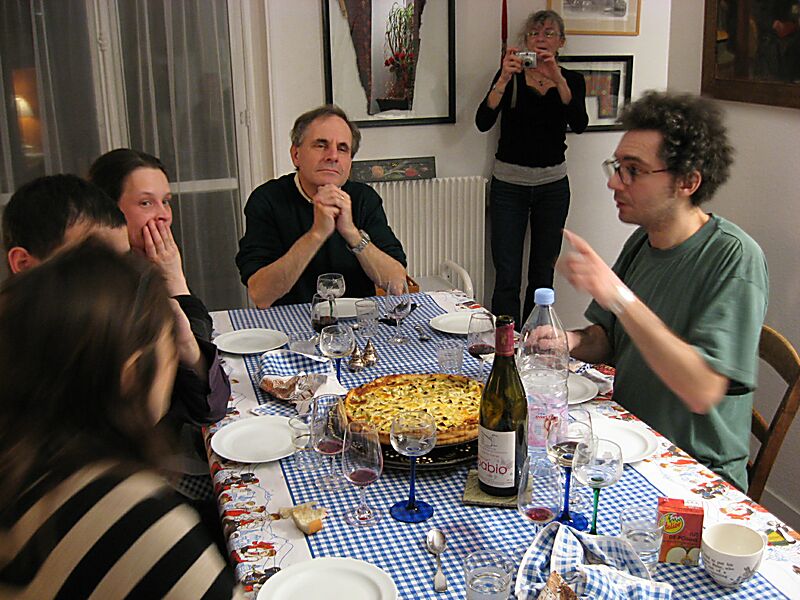 Martine, ever the photographer, and the rest of us take in the big torte before eating it. It was rhubarb. Yum.