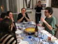 Martine, ever the photographer, and the rest of us take in the big torte before eating it. It was rhubarb. Yum.